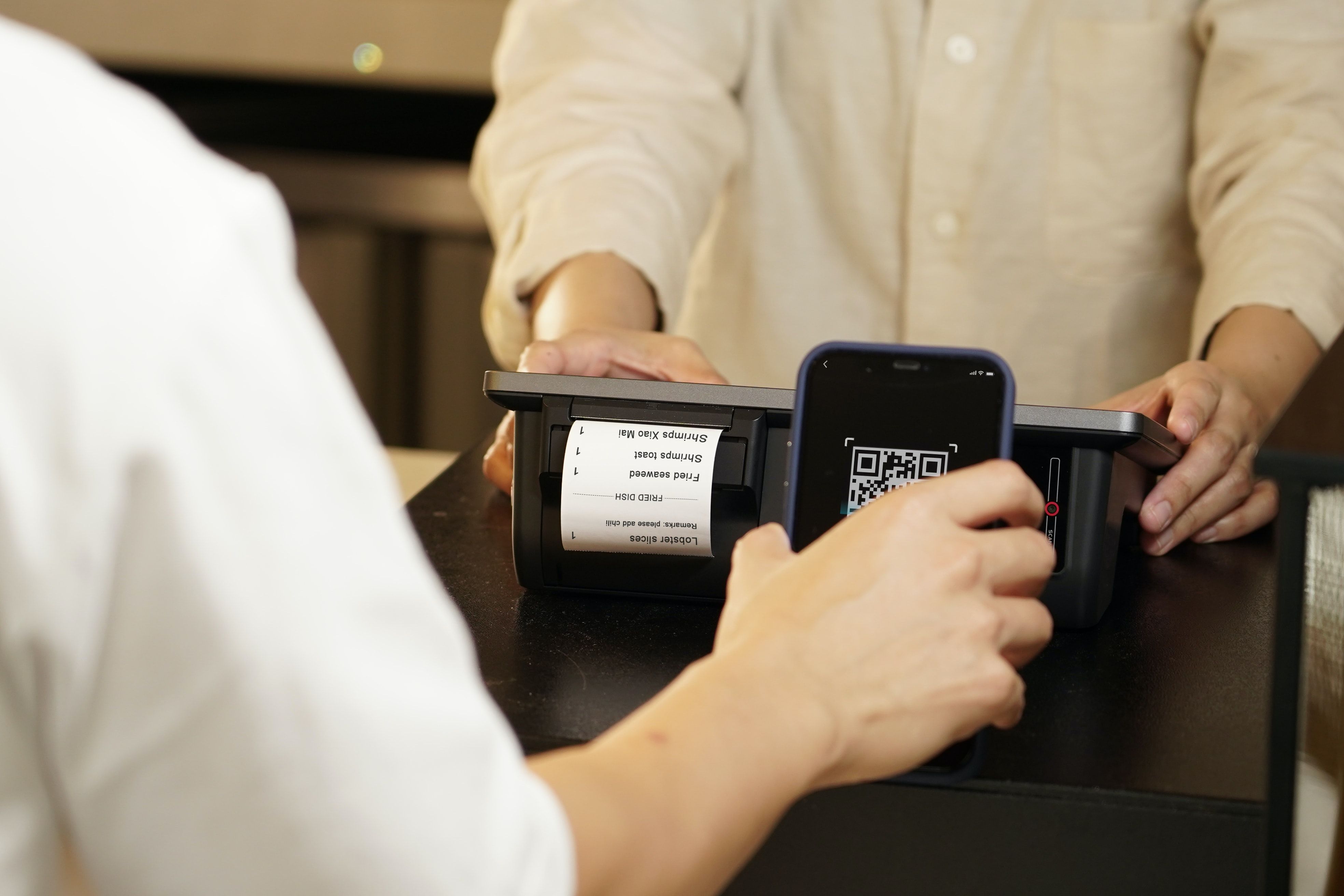 customer making payment at restaurant